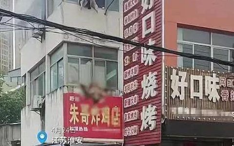 伟大母亲遇火灾，将两小孩扔下楼获救，自己身亡（火灾母亲5楼抛出儿女）